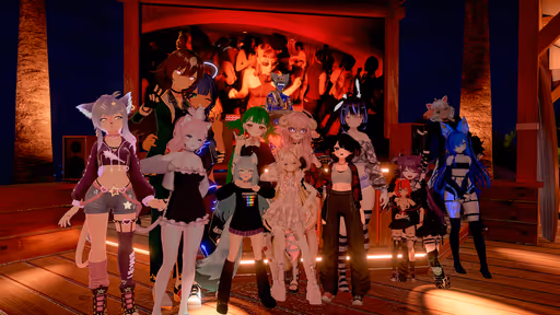 Arti and 14 other vrchat avatars posed in front of a DJ booth, within a wooden environment lit by the lights on the DJ booth. In the background is a screen displaying a DJ set as well as the ocean.